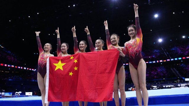 中国体操女团世锦赛夺冠 锁定洛杉矶奥运会团体参赛席位_副本.jpg